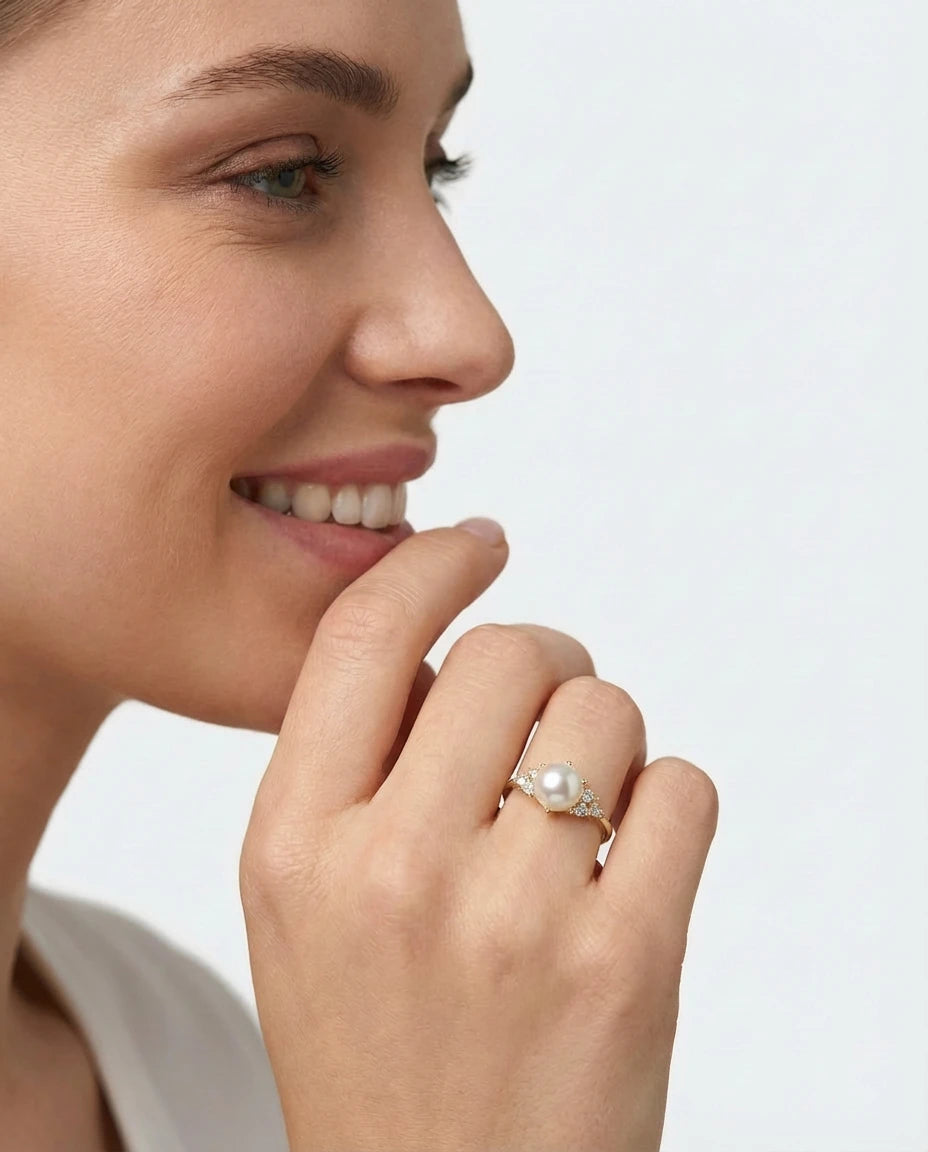prsten 14k zuta pozlata centralni biser beli cubic zirconia cirkoni elegantan