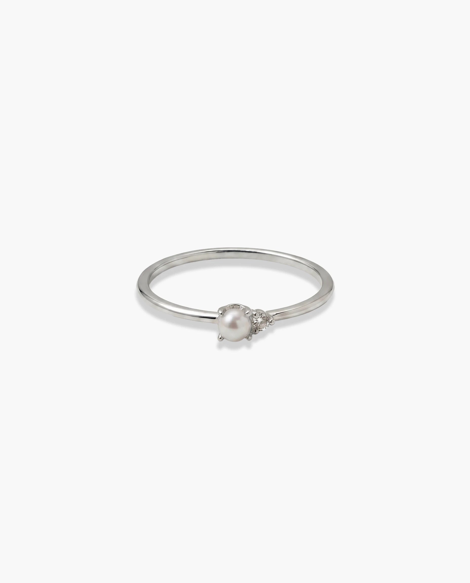 prsten srebro 925 rodijum biser i cubic zirconia cirkon minimalisticki