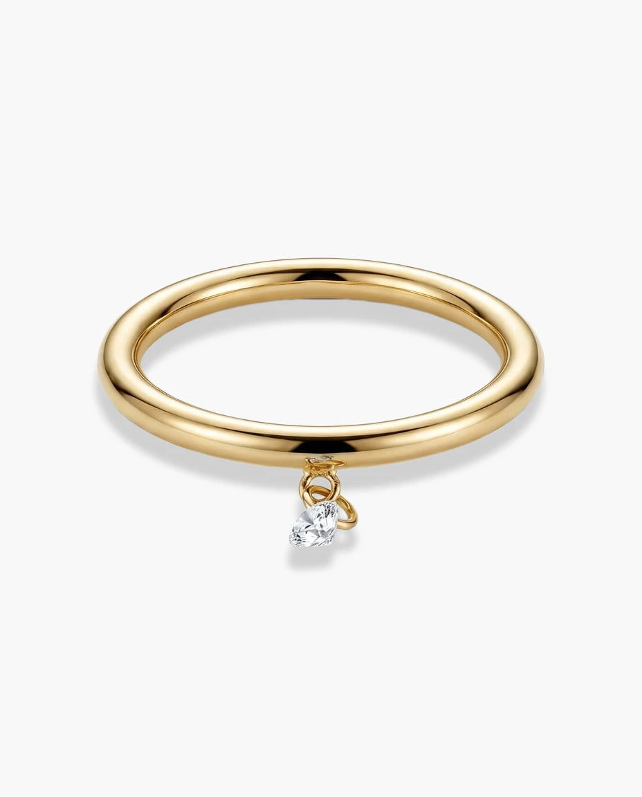 prsten 14k zuta pozlata viseci beli cubic zirconia cirkon minimalisticki elegantan
