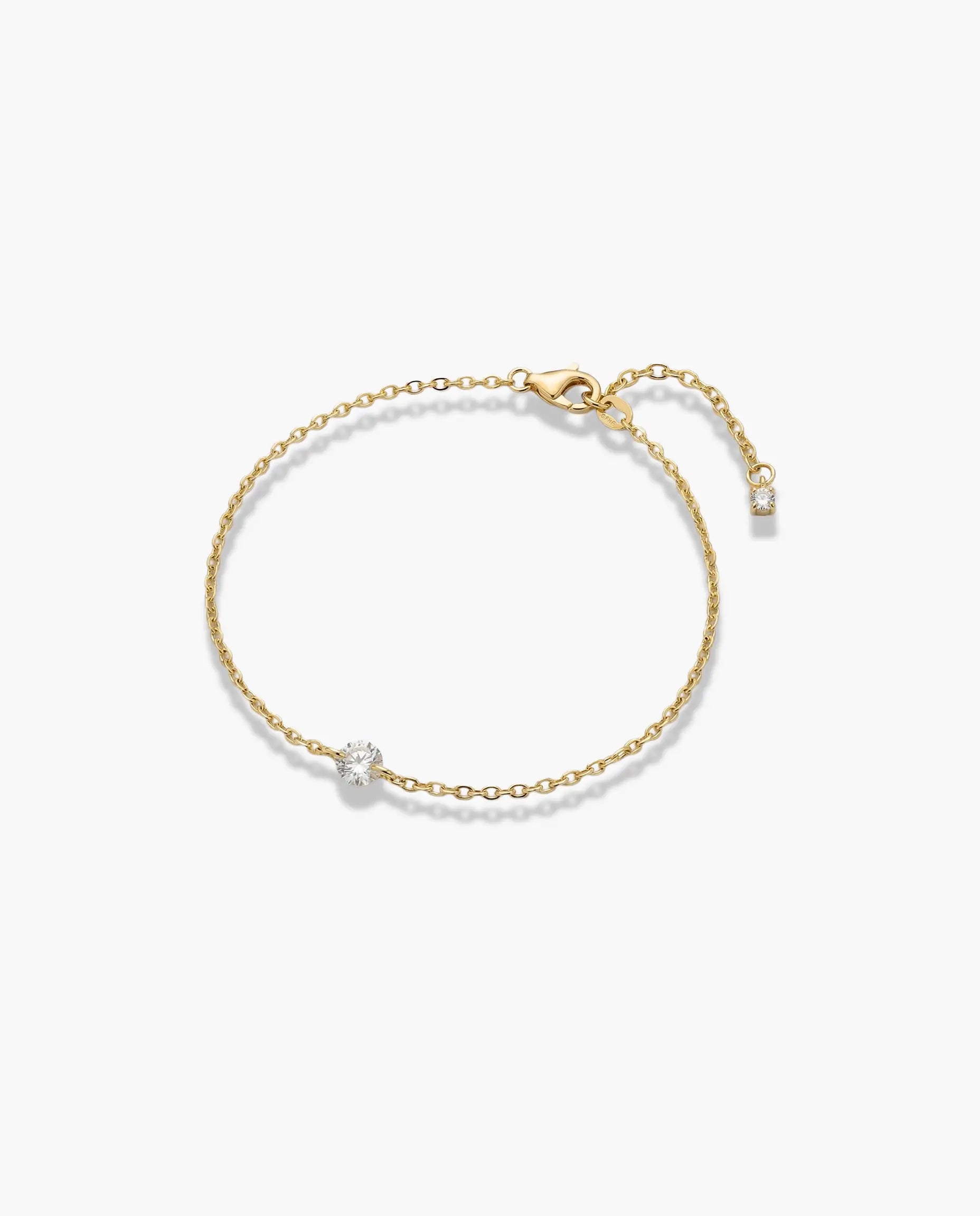 Srebrna narukvica sa jednim centralnim cirkonom na tankom lančiću 925 zuta 14k pozlata