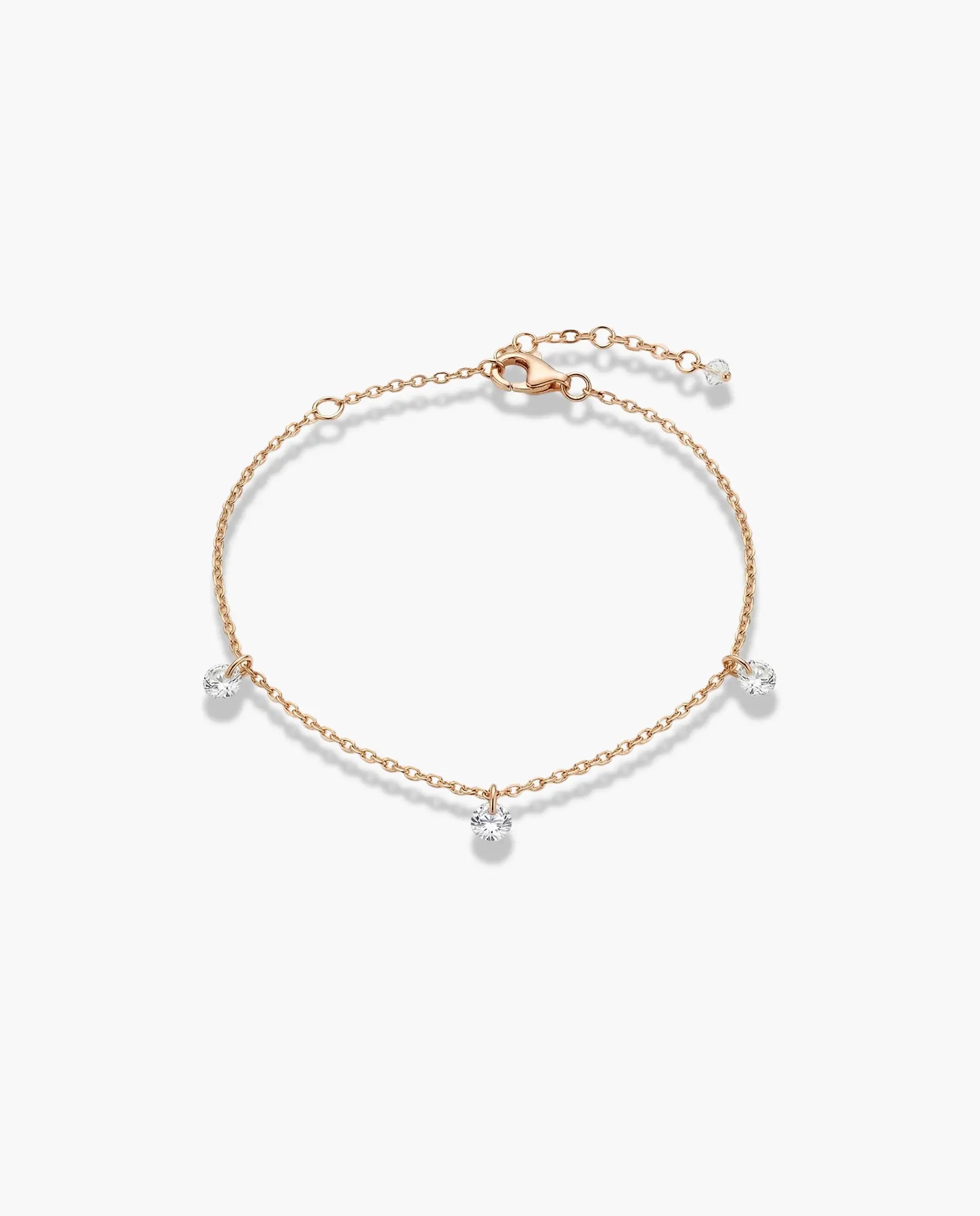 Image of Srebrna narukvica sa tankim lančićem i tri viseća cirkona 925 roze pozlata